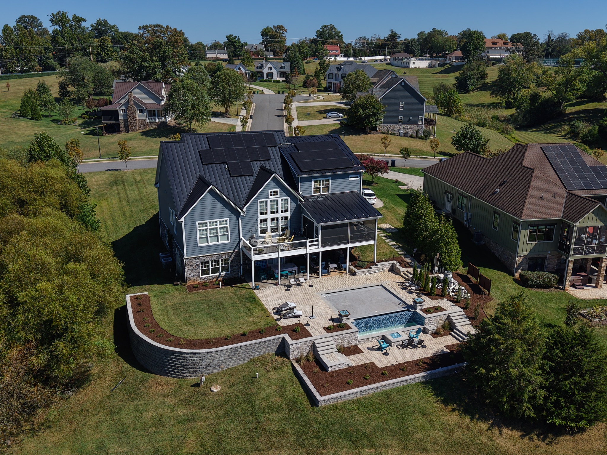 Edwards team performing lawn maintenance