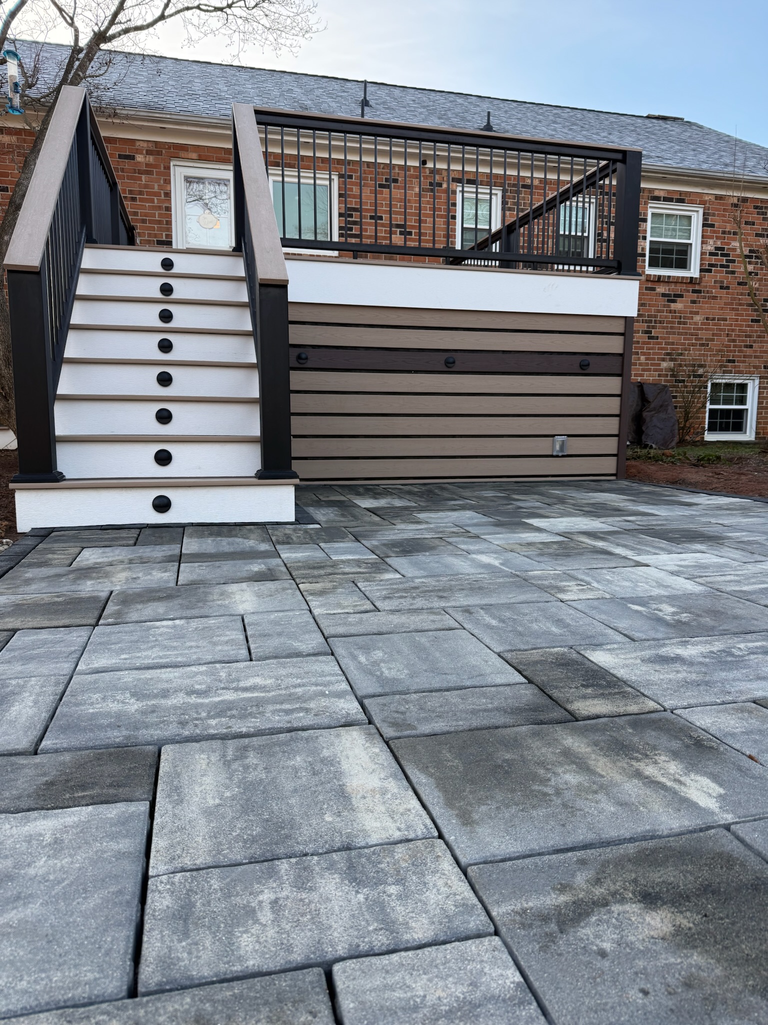Stone patio hardscape with seating area